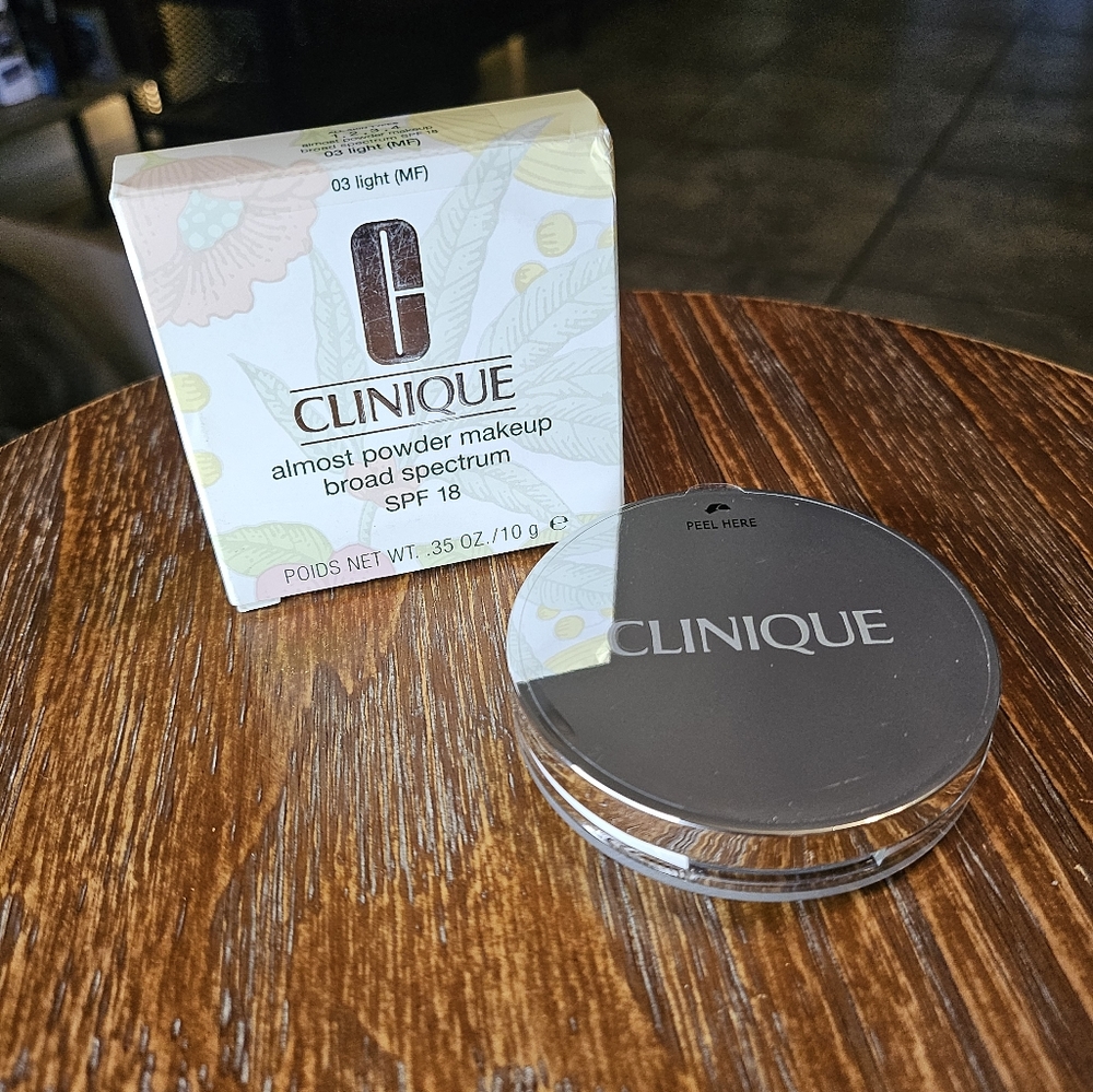 Clinique almost powder makeup up spf 18 shade 03 light